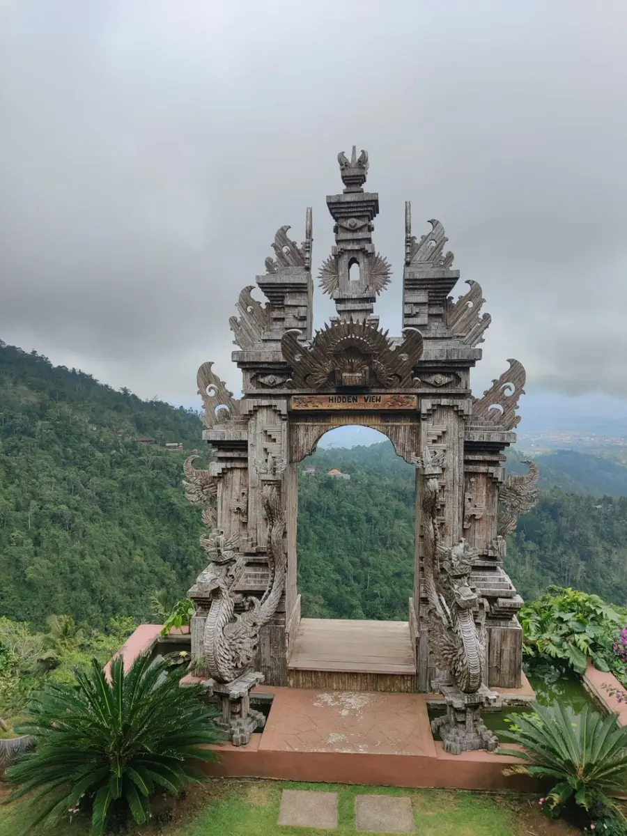 Wooden viewpoint gate in the mountain landscape near Lempuyang