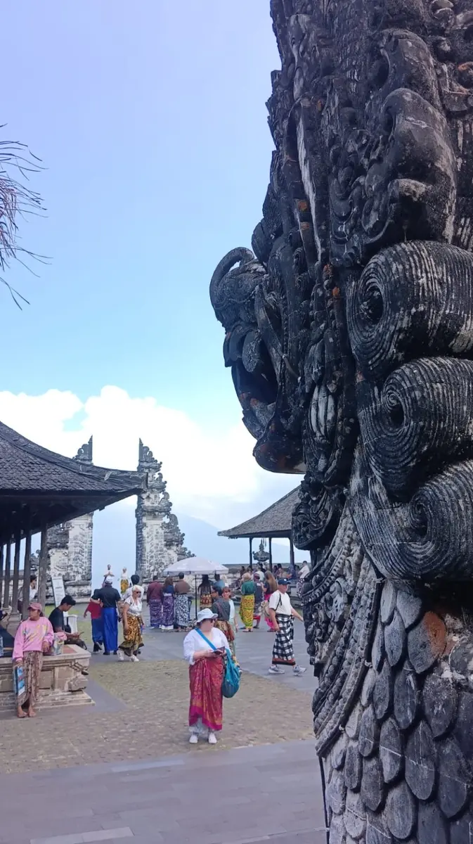 Detailed stone carving overlooking the Lempuyang Temple courtyard