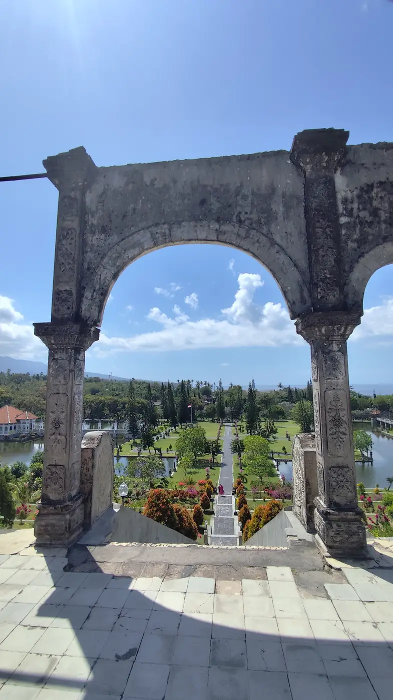 Stone archway and columns at Taman Ujung Water Palace